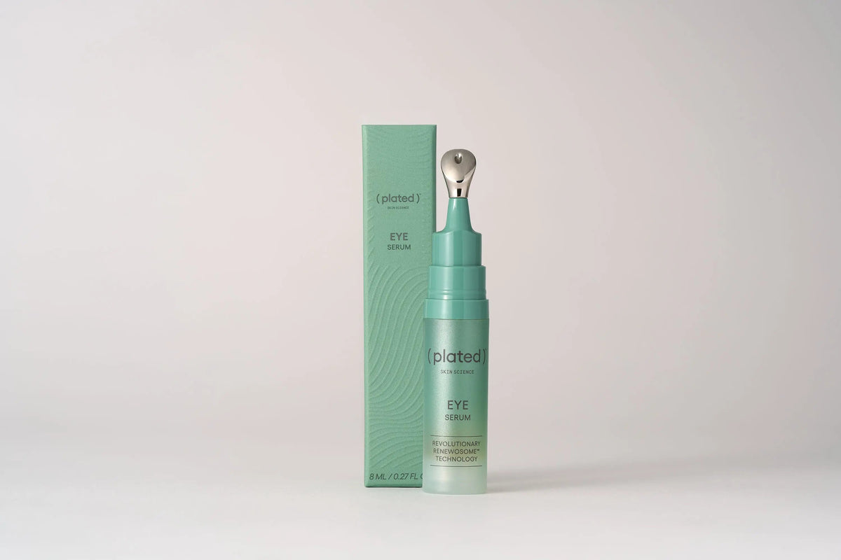 A bottle of Plated Eye Serum positioned in front of its packaging box against a light background.